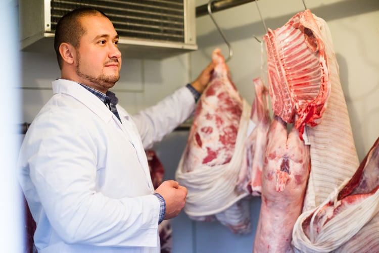 staff selling halal meat